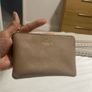 Coach Nude small Wristlet bag- Polished Pebbled Leather
In excellent condition